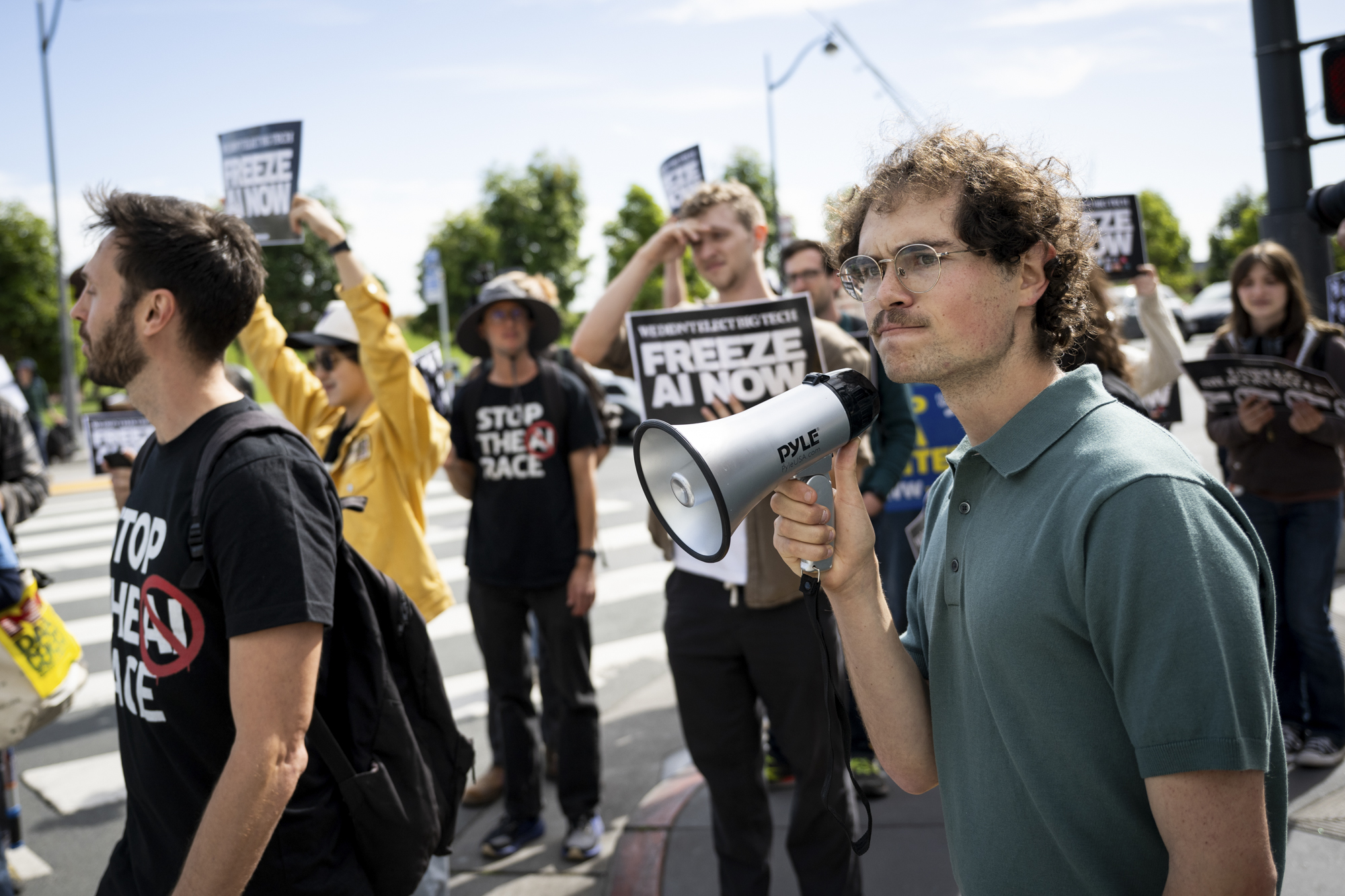 Bay Area activists rally outside OpenAI HQ to demand AI freeze